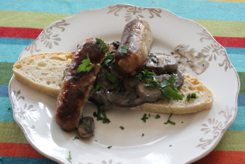 Creamy mushrooms on toast with sausages
